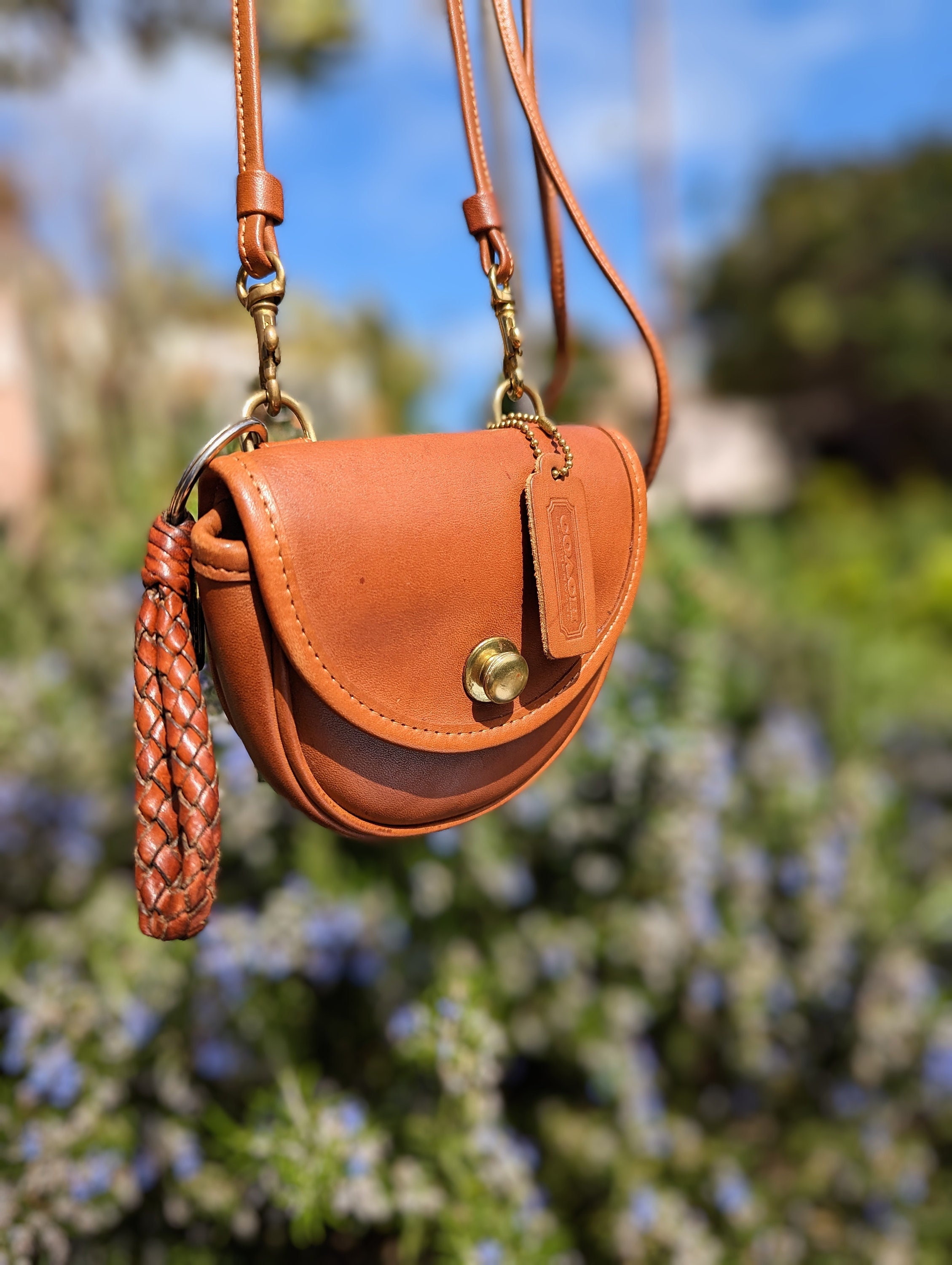 how cute is this coach bag charm 💭🤍🍒 #coach #bagcharm