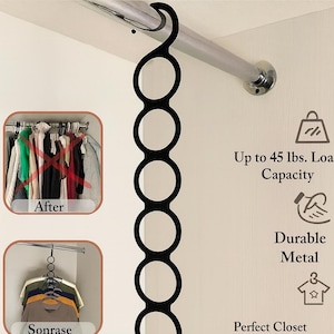 May include: A black 7-loop closet hanger made of durable metal. The hanger is designed for closet organization and can hold up to 20.4 kg. The text "7 Loop Closet Hanger" is at the top of the image.