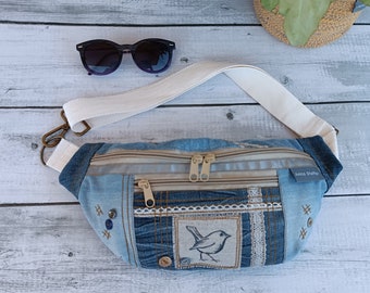 Fanny Pack made Recycled Denim with Adjustable Belt Strap and patchwork with Robin bird print, lace, and buttons on the front pocket.