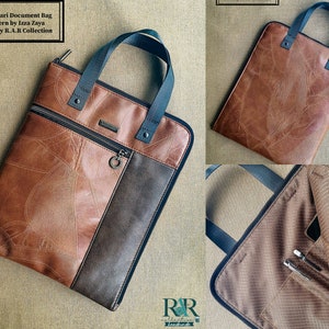 Puede incluir: Un bolso de cuero marrón para documentos con cierre de cremallera y dos asas superiores. El bolso tiene un diseño estampado en marrón y negro y el texto "Nilamsari Document Bag Pattern by Izza Zaya Sewn by R.A.R Collection" está impreso en la parte delantera.