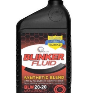 May include: A black plastic bottle of Blinker Fluid, a synthetic blend for LED and filament compatible lights. The bottle label is red and black with white text and features the text "BLW 20-20 Max Strength 1 US(OT)  NET 14.5 OZ".
