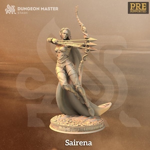 May include: A beige miniature figurine of an elf archer named Sairena, depicted in a dynamic pose drawing a bow with three arrows. The figure wears detailed armor and a flowing cape, standing on a circular base textured with small stones.