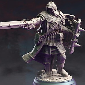 May include: A detailed 3D-printed figurine of a warrior in full armour, holding a large gun and a spiked shield. The figure is grey, with intricate details on the armour, boots, and weapon. The warrior stands on a rocky base.
