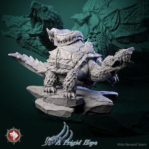 May include: A detailed, grey 3D-printed model of a fantasy creature, a turtle-like beast with a spiky shell and a dragon-like head. The model is posed on a rocky base, with the text "A Frigid Hope" and a logo.