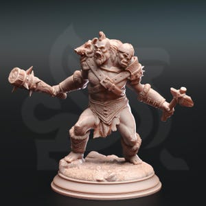 May include: A detailed figurine of a muscular warrior with two weapons. The figure is light brown, with intricate details on the armor, fur accents, and the two-headed shoulder piece. The warrior stands on a small, textured base.