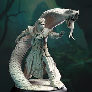 May include: A monochromatic off-white figurine of a warrior wearing a face mask and layered robes, standing in a dynamic pose. A large, detailed snake with an open mouth and visible fangs coils around the warrior, extending its head above them.