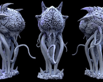 May include: A light blue, three-dimensional figurine of a creature with a large, brain-like textured head, multiple long tentacles extending downward, and sharp, pointed protrusions on top, standing on a rocky base against a black background.
