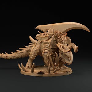 May include: A tan-colored fantasy creature figurine with a spiky tail, horns, and a large blade-like structure on its back. The figurine is posed on a circular base, showcasing intricate details.