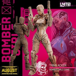 May include: A tan-colored resin miniature figurine of a futuristic soldier holding two pistols, shown from front and back angles. The figure features mechanical armor plating and cybernetic details. The background displays pink graphic art with the text "BOMBER GIRLS GANG", "TRINY ACKER", "AUGUST RELEASE", and "UNIT9".