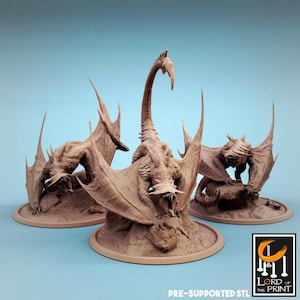May include: Three brown, unpainted resin dragon figurines on circular bases. Each creature features large, spread wings, sharp claws, and a long, curved tail. The central dragon has an open mouth with visible teeth. Text reads: LORD OF THE PRINT.