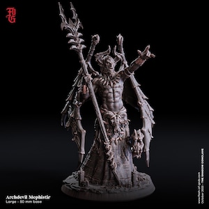 May include: A dark brown miniature figurine of Archdevil Mephistir standing on a 50 mm base. The figure features large wings, horns, and a long staff. It wears a skirt with a skull detail and holds one hand raised. Text includes Archdevil Mephistir.
