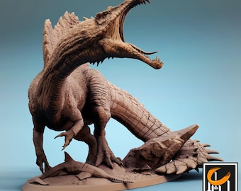 Puede incluir: Una figura de resina marrón detallada de un dinosaurio Spinosaurus con la boca abierta, sobre una base con una criatura similar a un pez. La base incluye el texto Lord of the Print y la frase Pre-Supported STL en color blanco.