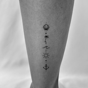 May include: A black and white line art tattoo design on a person's leg. The design features a seashell, palm tree, wave, sun, and anchor.