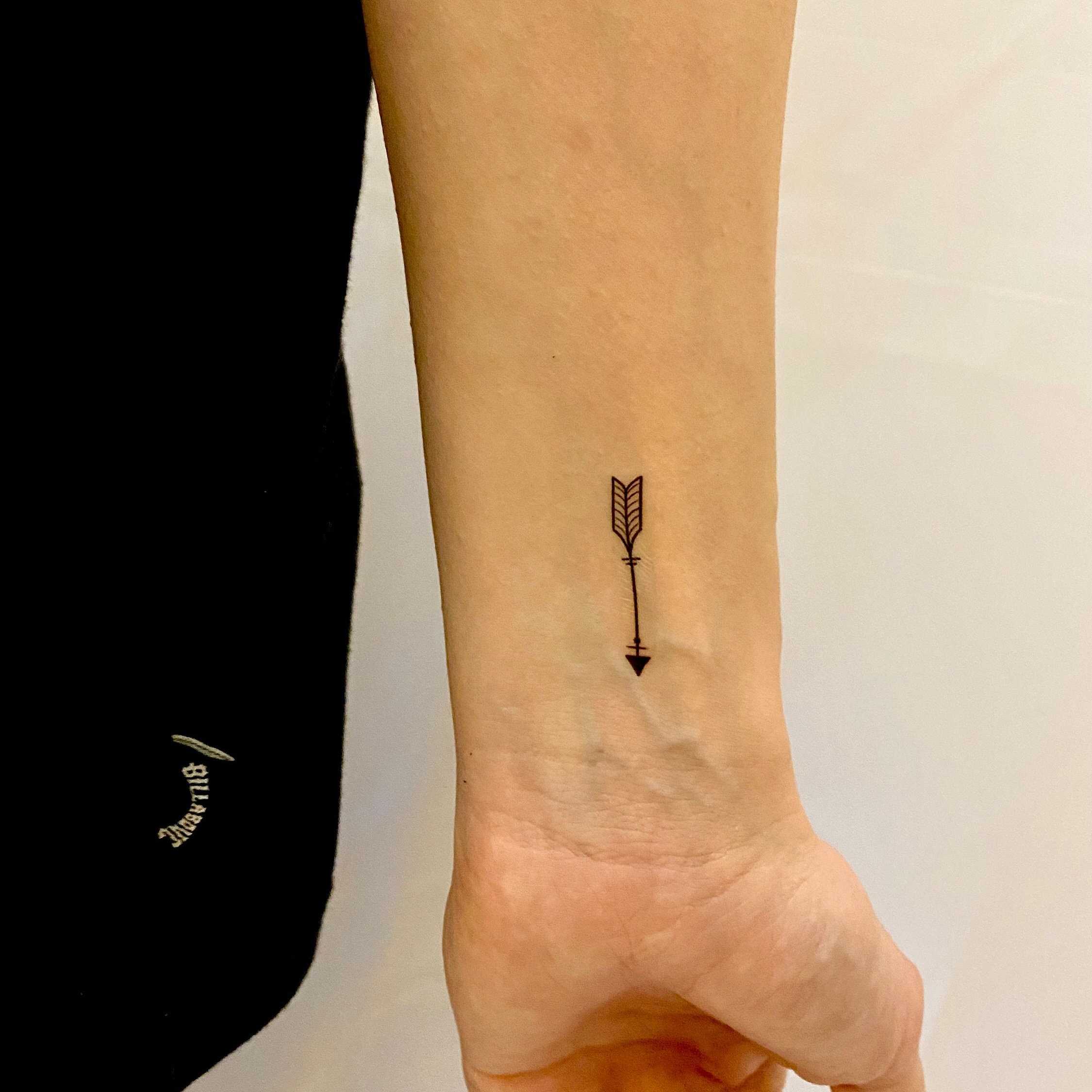 arrow tattoo foot