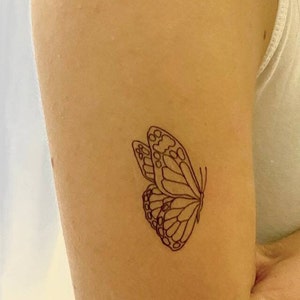 Hermoso Alas de Mariposa  Tatuaje de cruz con alas, Alas tatuaje, Hermosos  tatuajes
