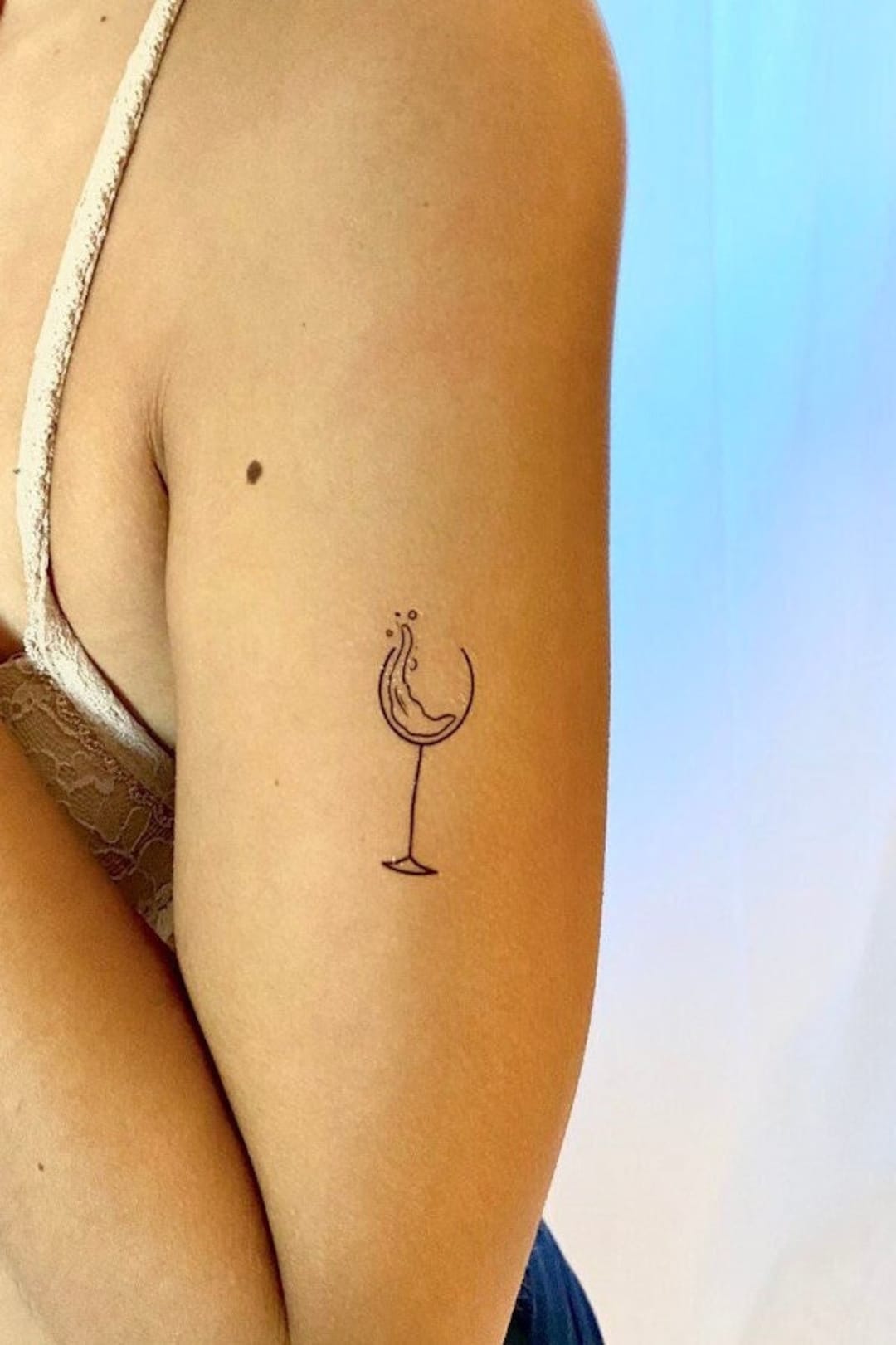 Minimalist wine glass tattoo for best friends