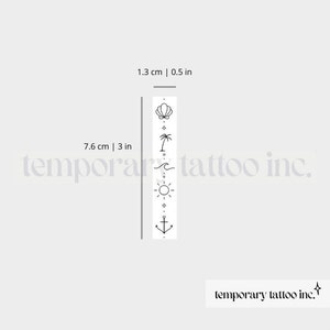 May include: A temporary tattoo sheet with a vertical design of five small black line drawings: a seashell, a palm tree, a wave, a sun, and an anchor. The sheet measures 7.6 cm by 1.3 cm.
