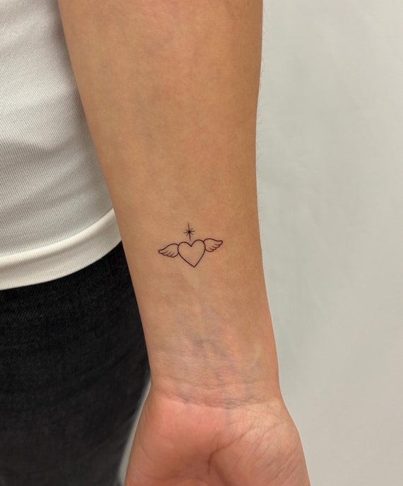 Tattoo Engel Klein Handgelenk