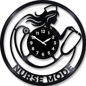 May include: Black wall clock featuring a nurse silhouette, stethoscope, and the words "NURSE MODE." The clock face is black with white numerals and hands. The design is cut from a vinyl record, creating a unique decorative piece.