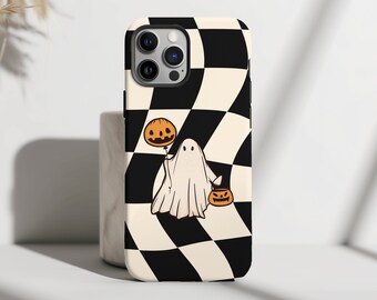 May include: A black and white checkered phone case with a ghost holding a jack-o-lantern and a pumpkin bucket. The case is designed for an iPhone.