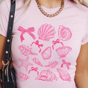 Pink Coquette Seashell Baby Tee: Coastal Summer T-Shirt