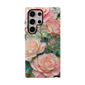 May include: A phone case with a floral design featuring pink and white roses with green leaves. The roses are stylized to look like stained glass.