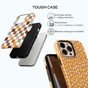 May include: A tough phone case with a geometric pattern in shades of brown, pink, and green. The case is compatible with wireless charging and has a raised bezel to protect the camera and screen.