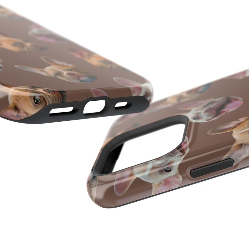 May include: Brown phone case featuring a repeating pattern of French bulldog faces. The case has a black border and cutouts for the camera and buttons. The design showcases the dogs' distinctive features, including their floppy ears and expressive eyes.