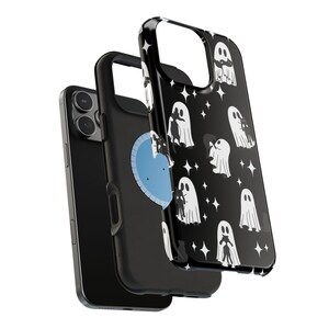 May include: Black phone case with a repeating pattern of white ghosts and black cats on a black background. The case is shown with a black phone and a second black case with a blue heart design.