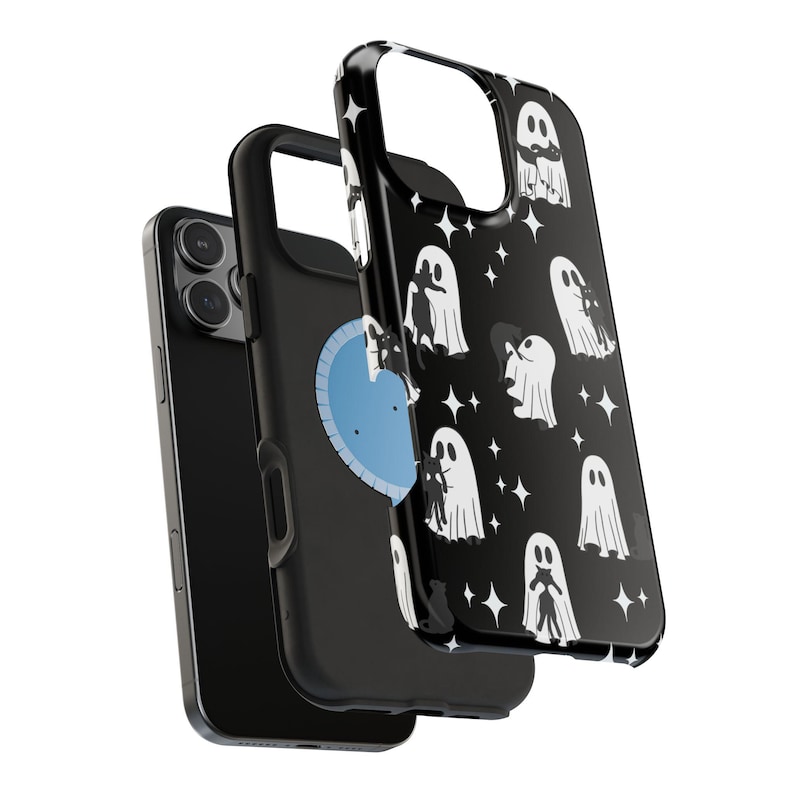 May include: Black phone case with a repeating pattern of white ghosts and black cats on a black background. The case is shown with a black phone and a second black case with a blue heart design.