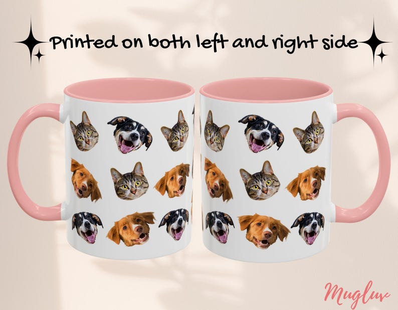 May include: Two white ceramic mugs with pink rims and handles. The mugs feature a repeating pattern of dog and cat faces. The text "Printed on both left and right side" is printed above the mugs.