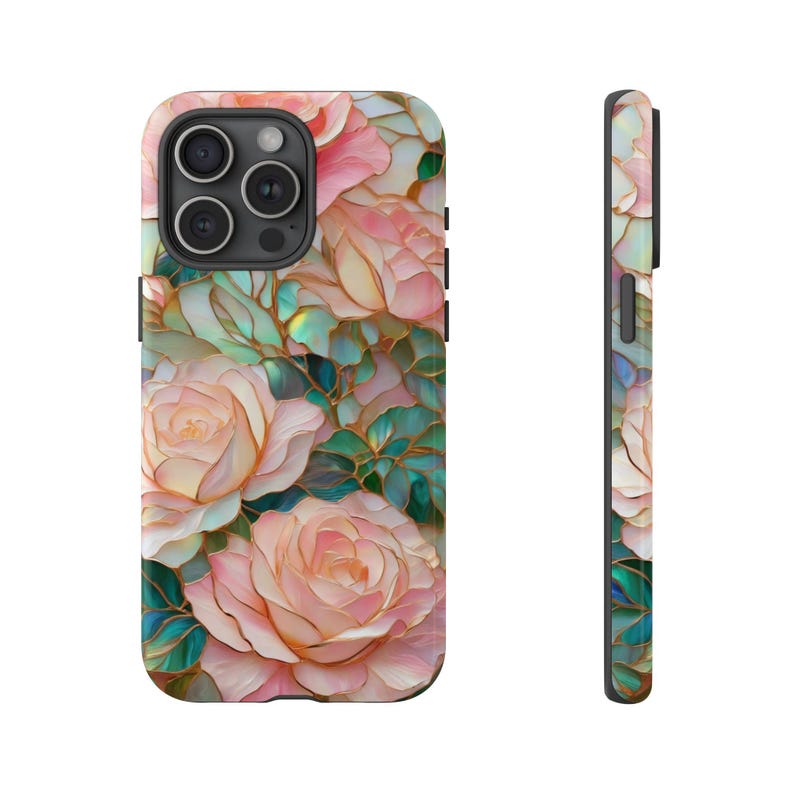May include: A phone case with a floral design featuring pink and white roses on a green and gold background.