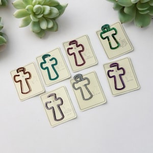 Välkommen till våra handgjorda bokmärken i korsform med klämmor!