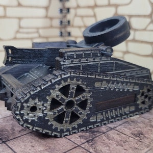 May include: A black wooden toy tank with a detailed design. The tank has a large wheel in the back and a smaller wheel in the front. The tank is made of wood and has a black finish.