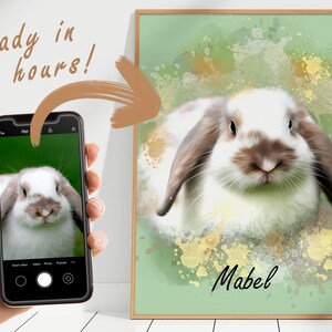 May include: A digital painting of a white and brown rabbit with floppy ears. The rabbit is looking directly at the viewer. The background is a green watercolor wash with gold splatters. The rabbit's name, "Mabel", is written in black below the rabbit.