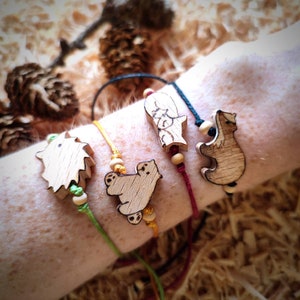 Solidarity bracelets in wood and cotton association animal protection wildlife