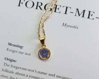 Pressed forget-me-not flower pendant with 18" goldtone stainless steel chain