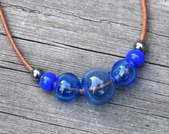 Boho Lampwork Glass Bead Necklace: Hollow Blue Pendant