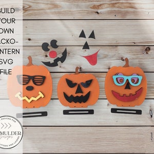 May include: Three orange pumpkin jack-o-lantern SVG files with different facial expressions. The pumpkins are layered with different colored facial features, including sunglasses, glasses, and a tongue. The text "BUILD YOUR OWN JACKO-LANTERN SVG FILE" is at the top of the image.