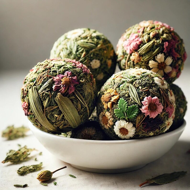 May include: Five round, green, dried flower arrangements in a white bowl. The arrangements are made with dried flowers, leaves, and grasses. The flowers are in shades of pink, white, and yellow.