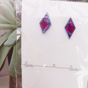 Bespoke resin earrings, gem inserted also multi glitter. Stunning, neat little studs silver plated posts and backs.