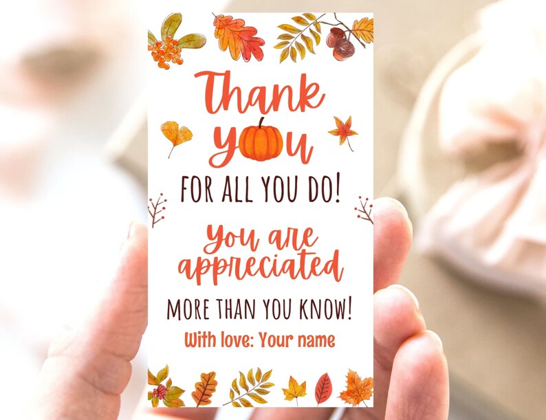 May include: A rectangular white card with the text "Thank you for all you do! You are appreciated more than you know!" in orange script. The card features watercolor illustrations of autumn leaves and a pumpkin. The words "With love: Your name" are at the bottom.