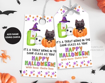 May include: Two Halloween-themed gift tags with a black cat in a pumpkin, a ghost, and a witch's hat. The tags read "It's a treat being in the same class as you!" and "Happy Halloween!" with the text "Add name using Canva".