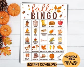 May include: A printable "Fall Bingo" game card with autumn-themed illustrations and text. The card features images of an acorn, pumpkin, and maple leaf. The text "Fall Bingo" is at the top, with "Instant Download" at the bottom.