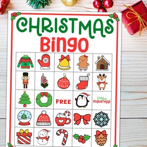 May include: A Christmas Bingo card with 25 squares featuring various Christmas-themed images, including a snowman, a stocking, a gingerbread house, a candy cane, a Christmas tree, a wreath, a penguin, a snowflake, a bell, a mitten, a nutcracker, a present, a hot chocolate mug, a bow, and a holly sprig. The center square says "FREE".