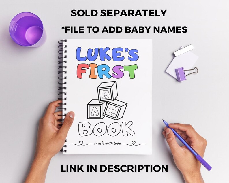 May include: A white spiral bound notebook with the words "LUKE'S FIRST BOOK" in colorful letters. The notebook has a drawing of colorful blocks with the letters A, B, and C on them. The text "SOLD SEPARATELY *FILE TO ADD BABY NAMES" is at the top of the image. The text "LINK IN DESCRIPTION" is at the bottom of the image.