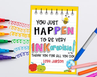 May include: A yellow card with a lined background and a message that reads "You just happen to be very INKcredible! Thank you for all you do! Love: Jakson". The card features a bee, a pencil, an apple, and a globe.