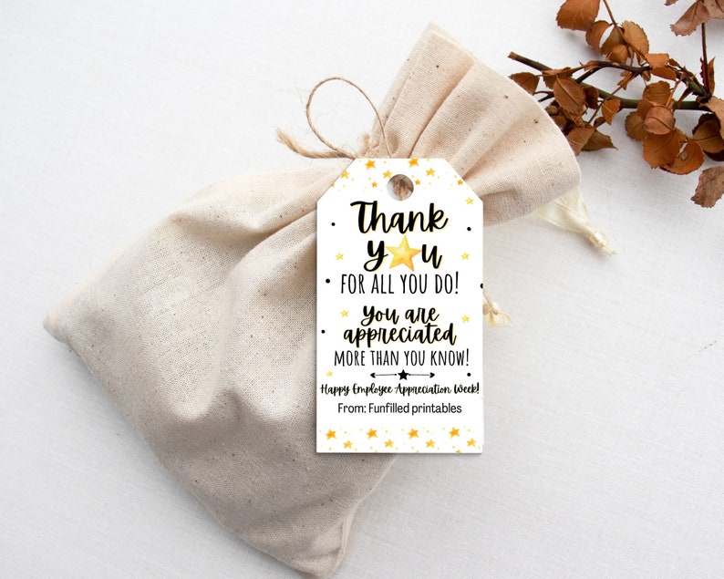 May include: White gift tag with gold stars and black text that reads "Thank yu for all you do! You are appreciated more than you know! Happy Employee Appreciation Week! From: Funfilled printables"