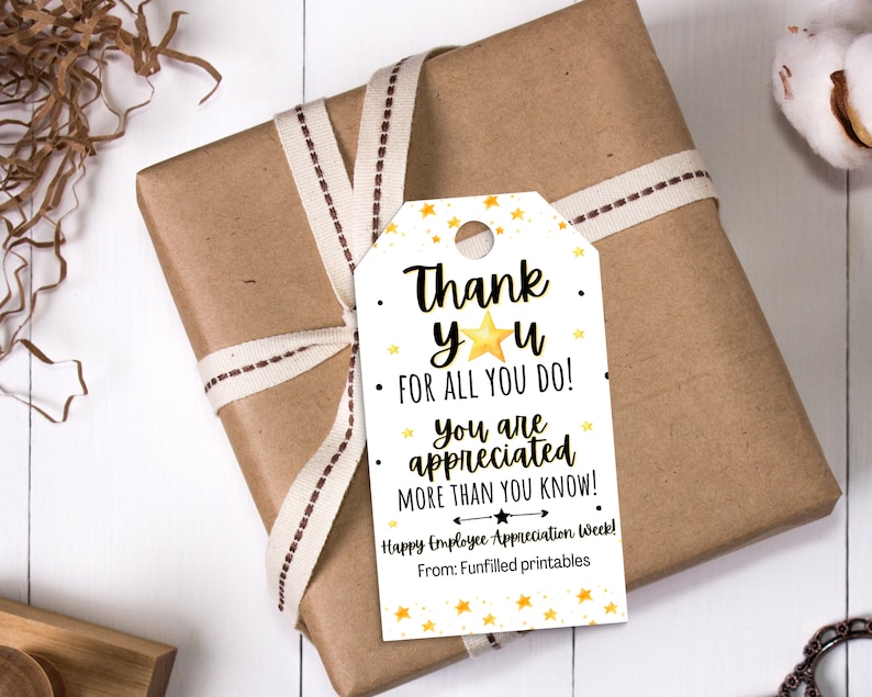 May include: White gift tag with gold stars and black text that reads "Thank yu FOR ALL YOU DO! You are appreciated MORE THAN YOU KNOW! Happy Employee Appreciation Week! From: Funfilled printables"