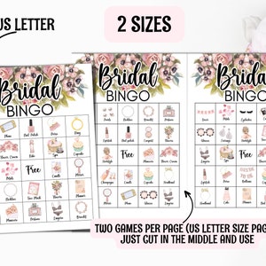 Puede incluir: Dos tarjetas de bingo de boda imprimibles con un dise&ntilde;o floral. Cada tarjeta tiene una cuadr&iacute;cula de 5x5 con casillas que contienen varias palabras con tem&aacute;tica nupcial como "anillo", "esmalte de u&ntilde;as", "ramo", "tiara", "pastel", "gratis" y "novia a ser". El texto "Dos juegos por p&aacute;gina (tama&ntilde;o de p&aacute;gina carta de EE. UU.), simplemente corta en el medio y usa" est&aacute; en la parte inferior de la imagen.